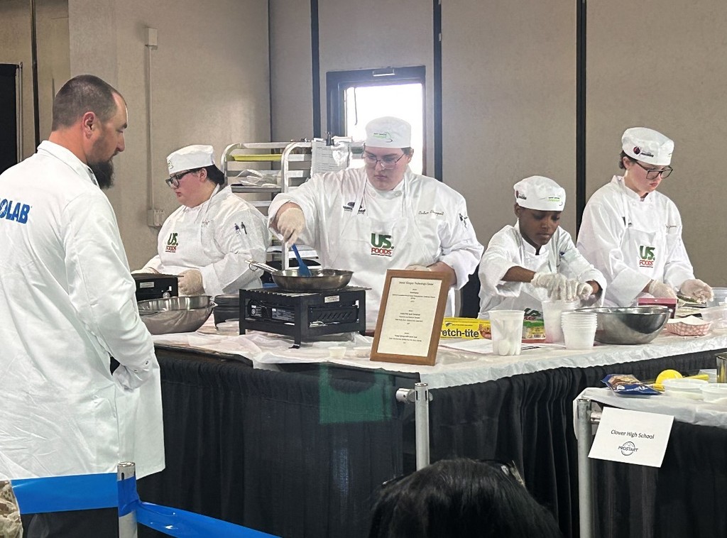 Culinary team competing and cooking